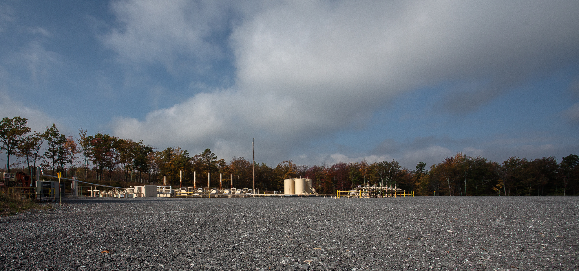 A typical well pad. Much of the pad extends beyond the right edge of the frame. This pad has 6 active wells currently producing gas, with room for many more (photo: Chad Shmukler). fracking well pad