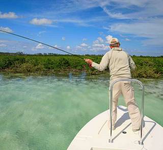 Angler Jock Conyngham makes a second cast a fleeing Bahamas bonefish