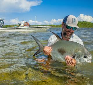 angler holding permit bahamas