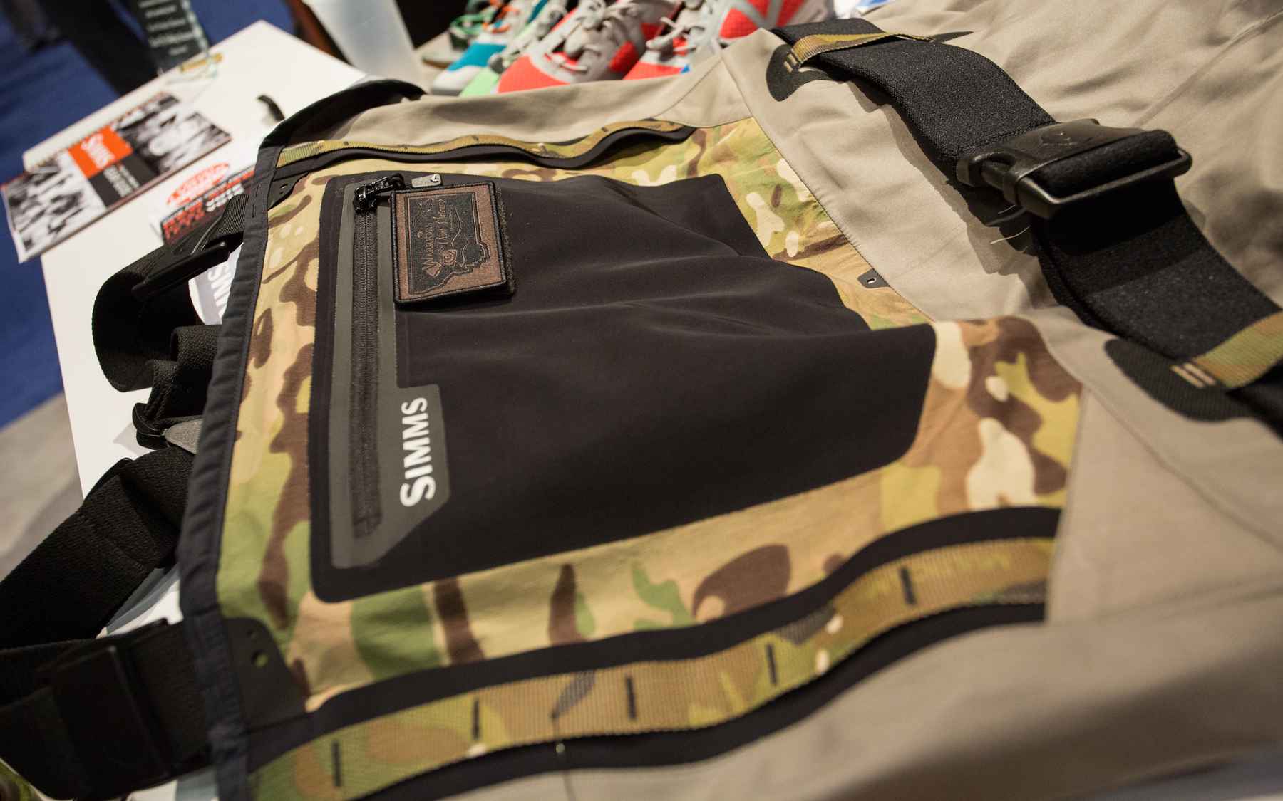 The MOLLE webbing and camo front pocket on Simms' new WQW wader (photo: Chad Shmukler). Simms Warriors & Quiet Waters Waders