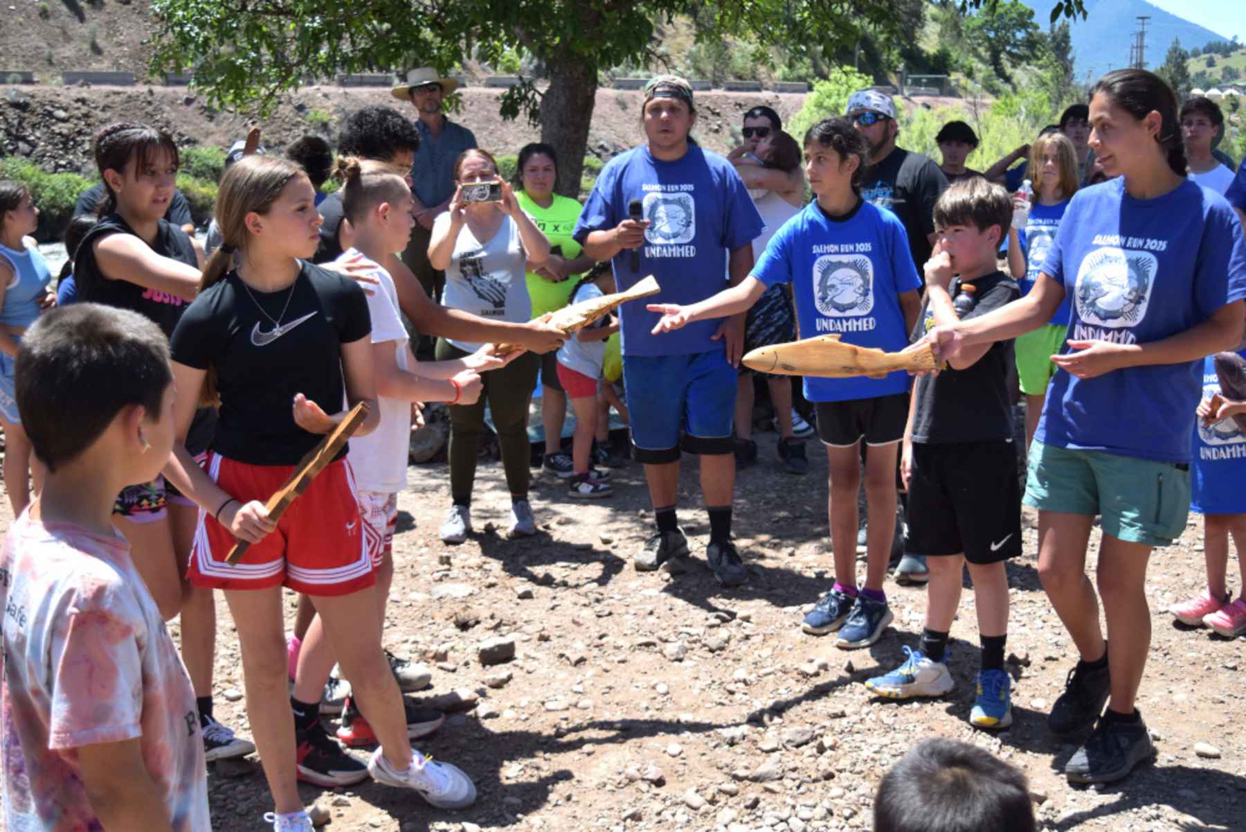 Wooden salmon for the relay race (photo: Juliet Grable). klamath river relay race