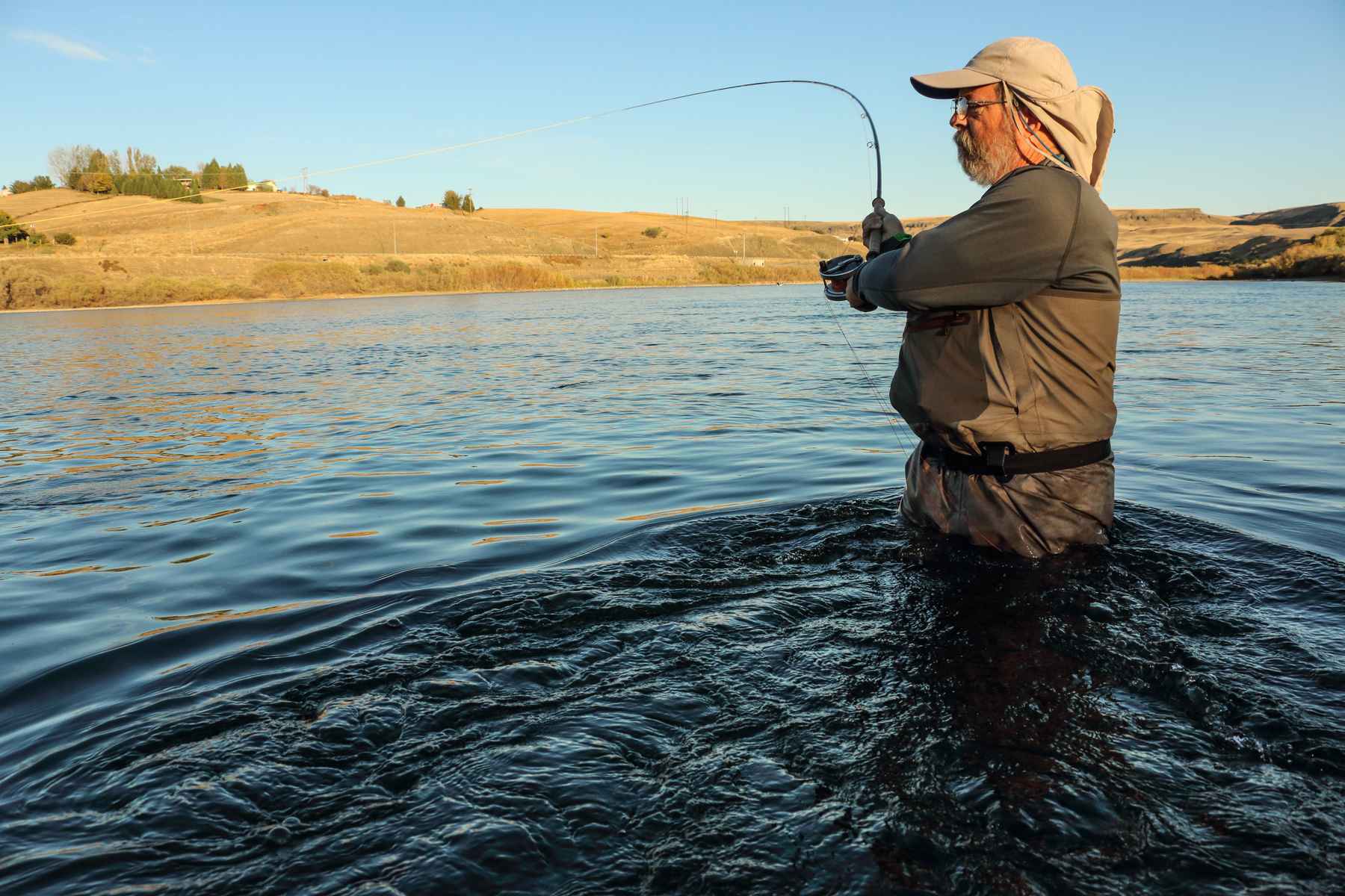 Steelheader Craig Lannigan swings a spey rod on Idaho’s Clearwater River (photo: Kris MIllgate). steelhead fishing clearwater river