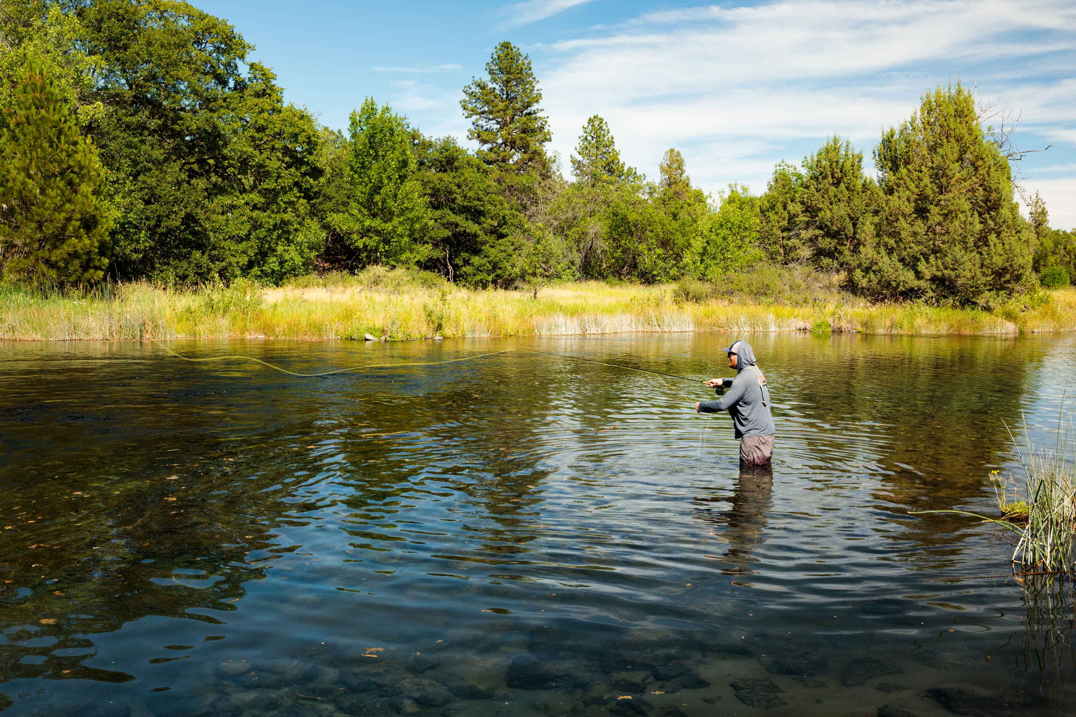 Dan Johnson fishing the Ahjumawi Lava Springs