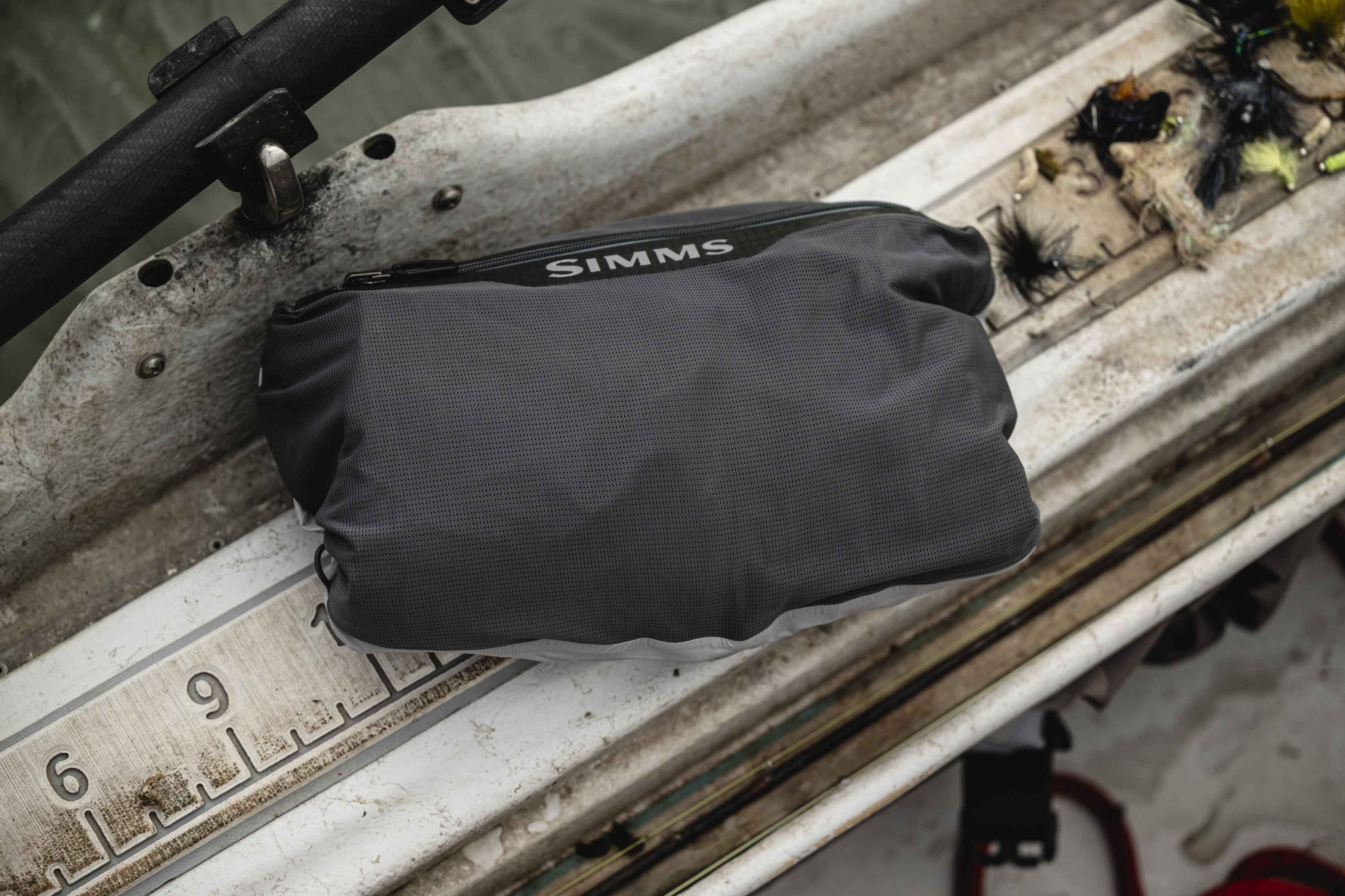 The Flyweight Packable wader packed into its integrated stuff sack (photo: Darcy Bacha). simms flyweight packable wader in stuff sack