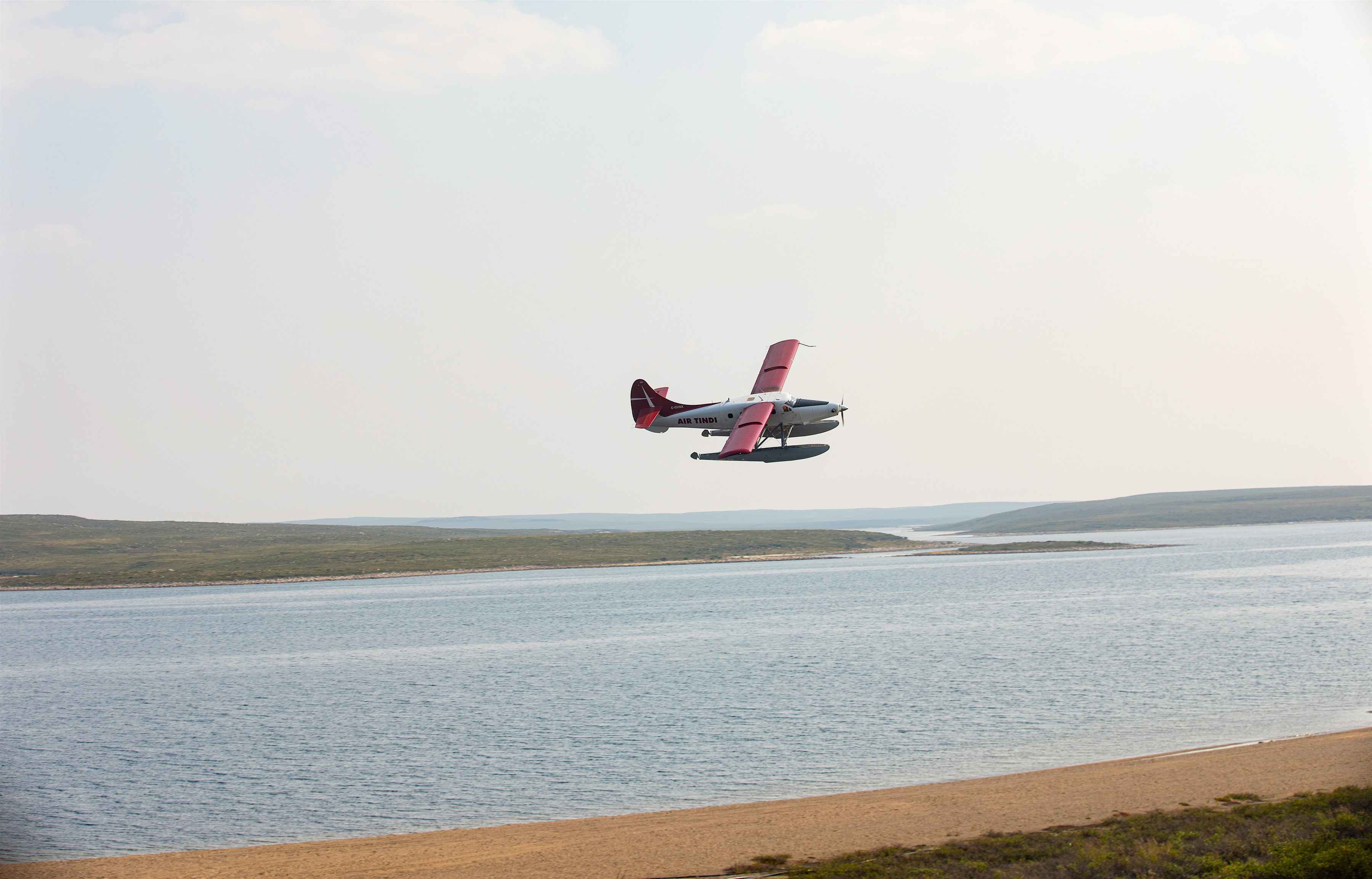 Flying over the tundra of the Northwest Territories in a float plane