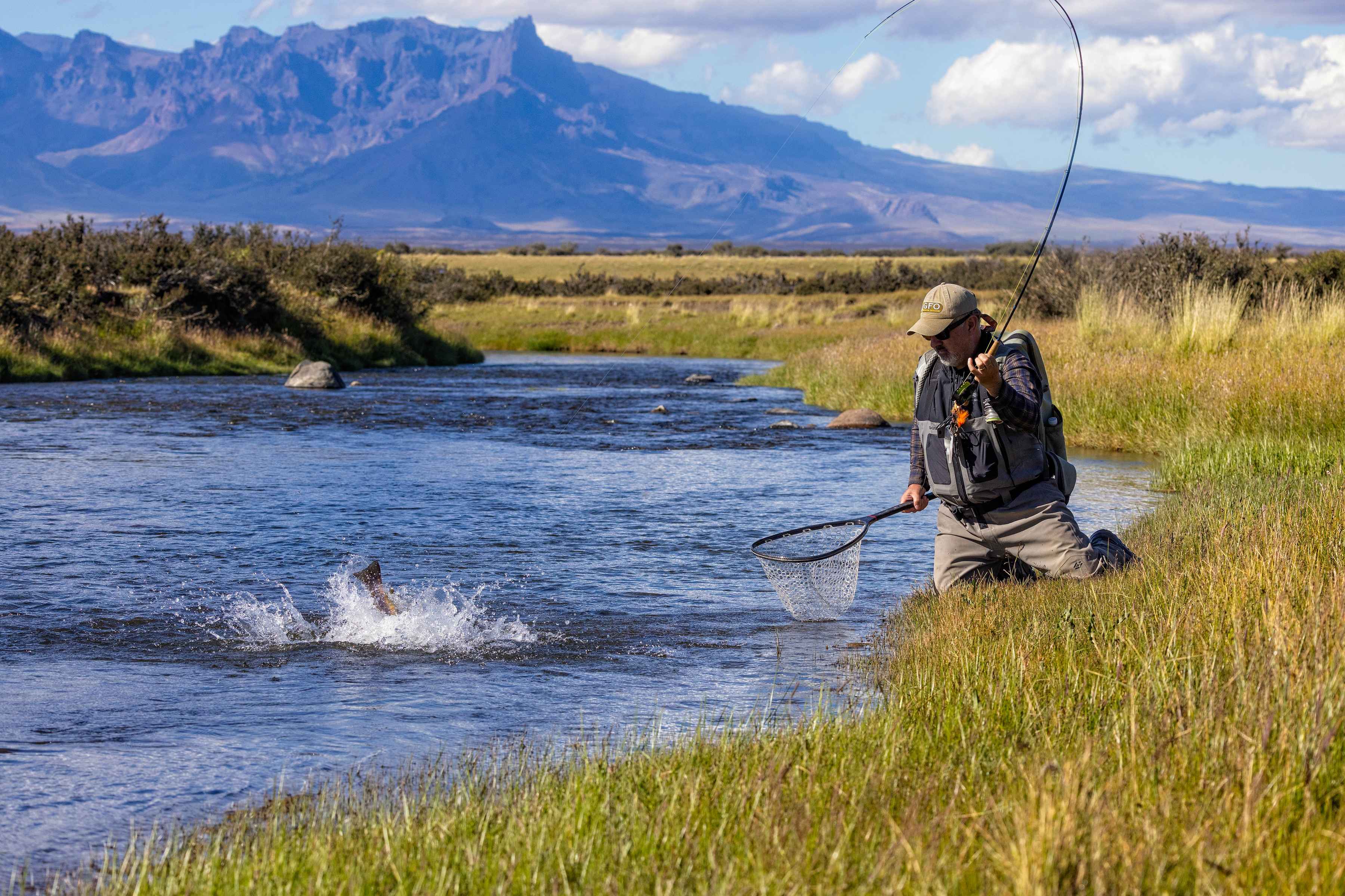 Photo: Earl Harper. fly fishing spring creek sierra with baguales in the background