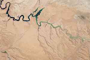 Lake Powell, seen half full in this 2014 Landsat satellite image. Today, Lake Powell is considerably lower, hitting its lowest recorded levels