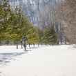 angler walking in snow