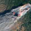 camp fire from space
