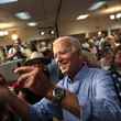 Joe Biden poses for a photo-op with campaign supporters