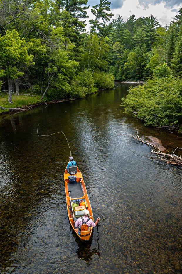 fly fishing from a boat