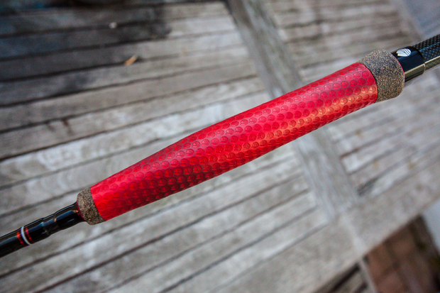 The grip, featuring a season of filth. The handle reportedly cleans off easily for those who aren't too lazy to wipe it down. Redington Vapen Red Grip