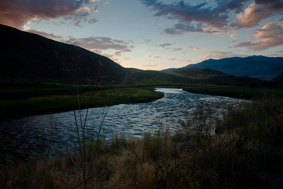 The sun sets on the Gardiner River in Yellowstone National Park.