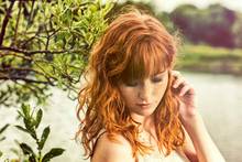 redhead by river