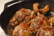 duck confit in cast iron skillet