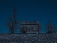 old farmhouse at night