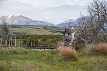 fly fishing guide and client