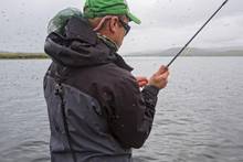 Photo: Earl Harper black flies swarming fisherman
