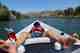 child in a drift boat