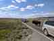 Traffic builds as vehicles stop to view a bison, the most popular animal among roadside wildlife watchers in the park (photo: Chris Hunt). yellowstone national park traffic jam