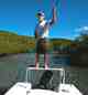 Chris Goldmark poles his custom flats boat in Culebra's crystal clear waters. Chris Goldmark